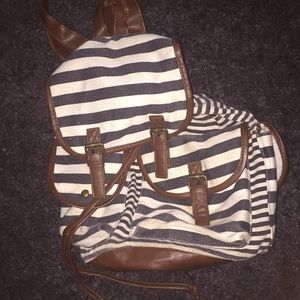 Striped black, brown and white bag used